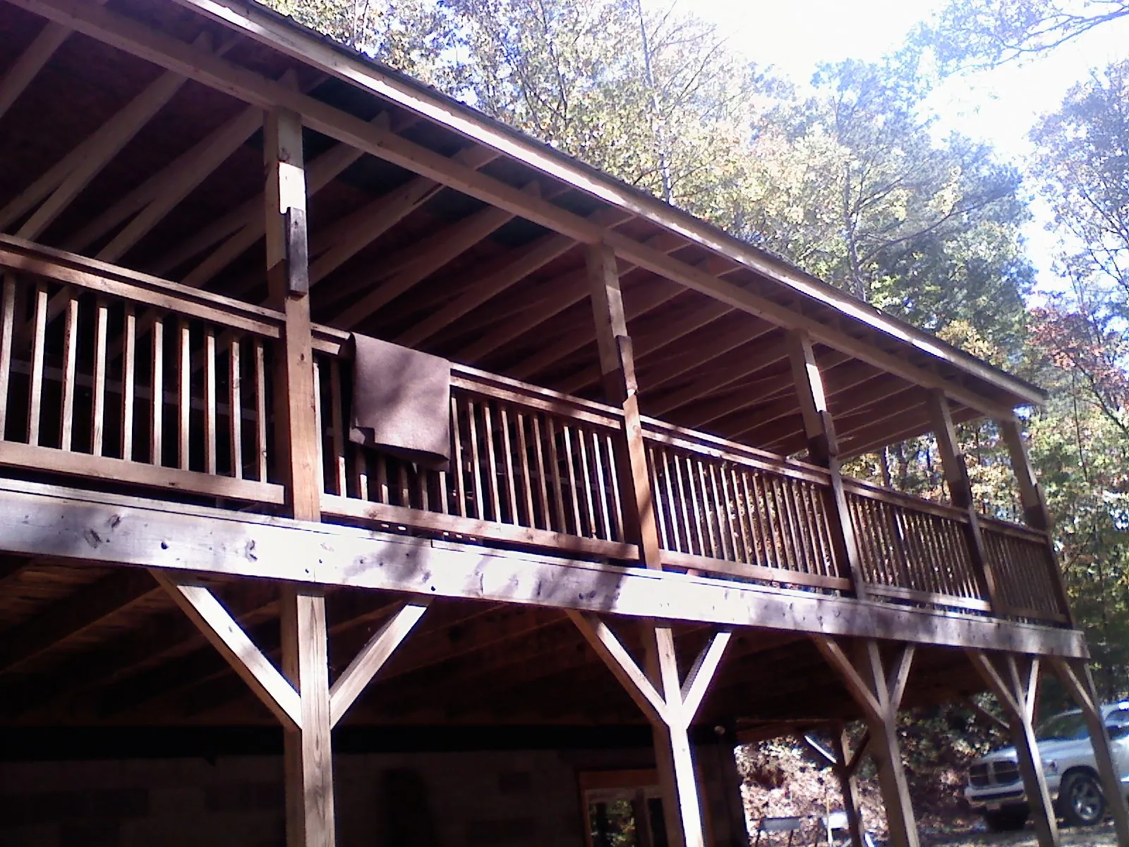 Timber framing under a new elevated porch and deck — Roof Leak Repair in Mcintosh by Roofing Brothers